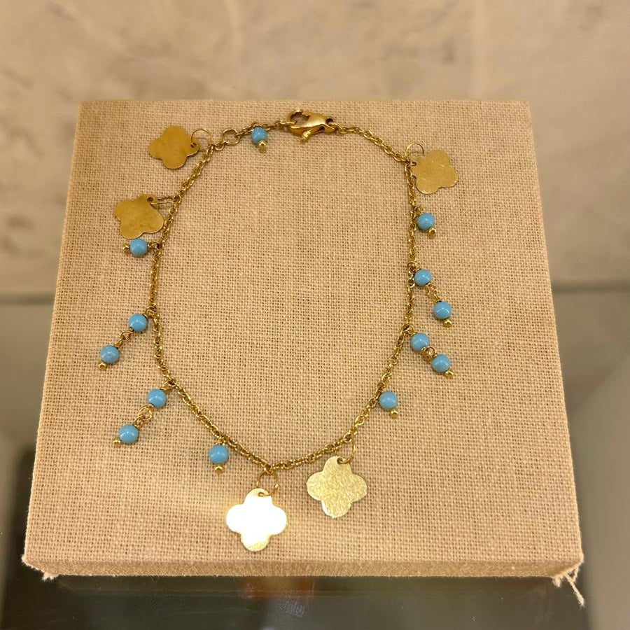 Pulsera bolitas azules en oro de 18 kl